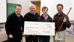 Winner, John Hall receives his check for my first sponsored project at KU.